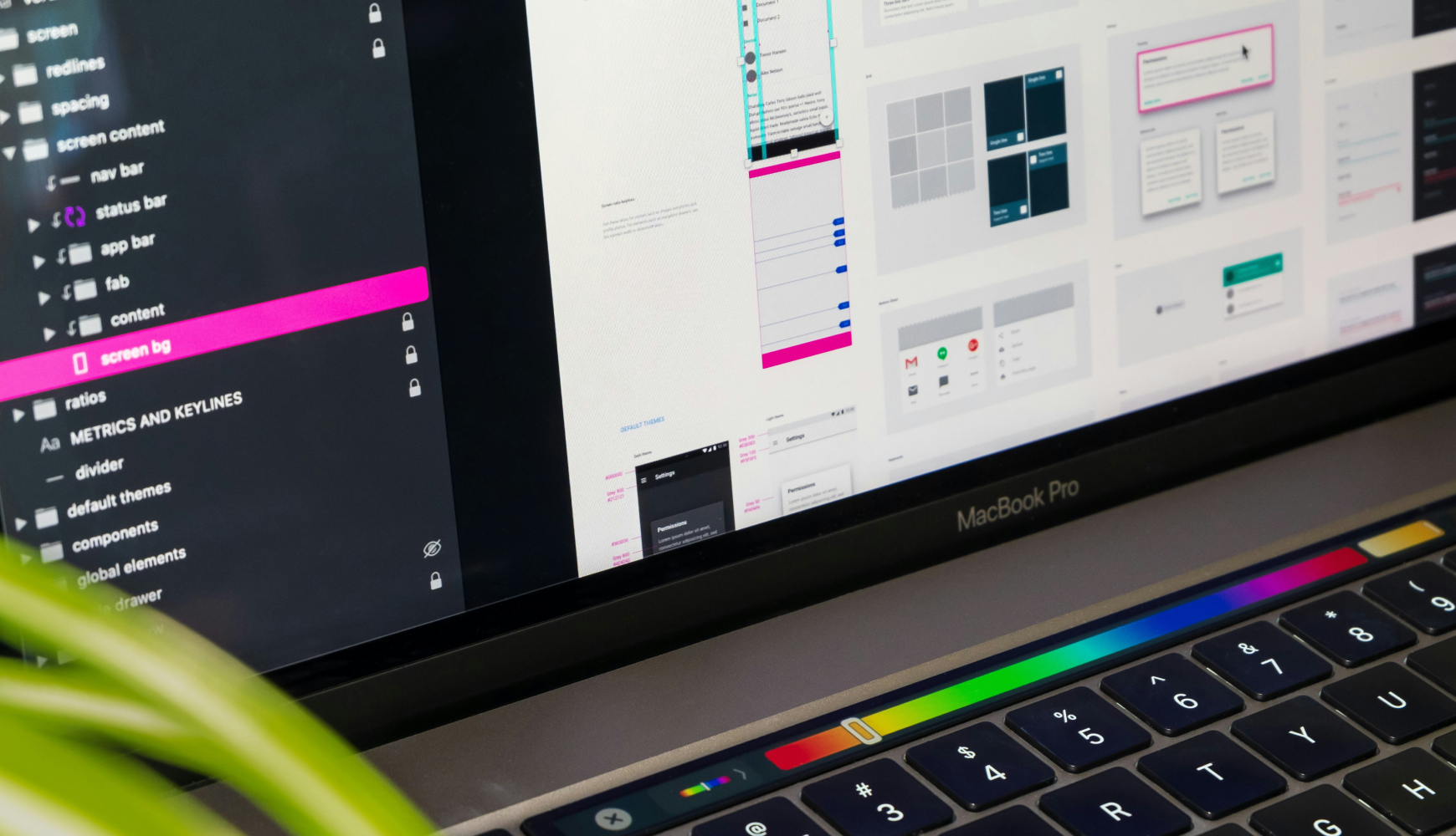 Web designer working on multiple design components showing the limited capacity cons of hiring a freelance web designer for complex projects