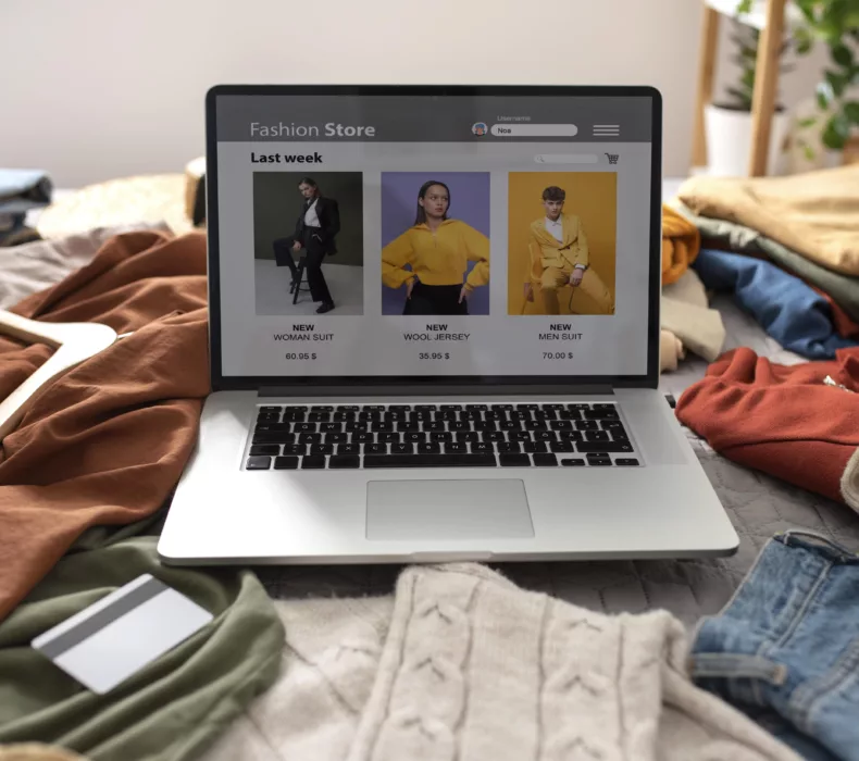 High angle clothes bed fast fashion concept