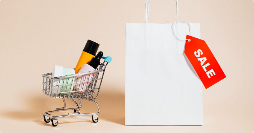 A shopping cart featuring a sale tag, symbolizing global ecommerce trends and the rise of online shopping discounts.